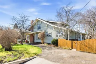 Driveway from Division St connects covered carport and garage