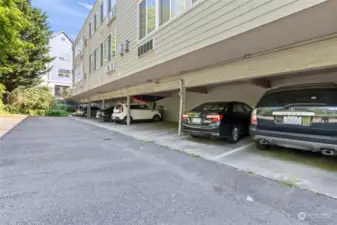 Carport is secure in back of building with security gate. #303 is second one from the right.