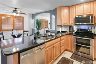 Kitchen with ample eating space. Photo taken prior to recent painting. The blue/gray is now white.