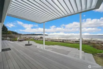 Enjoy the large deck, perfect for entertaining and summer BBQs.  On warmer days, relax under the adjustable louvred roof.
