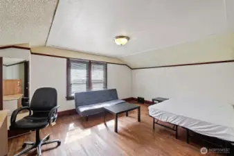 upstairs bedroom 1, all rooms come furnished