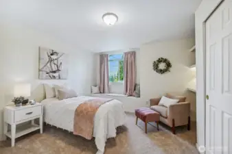 One of the two extra bedrooms upstairs is south facing and takes advantage of the beautiful sunsets. Window seat is perfect for enjoying them!