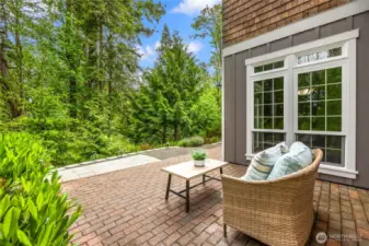 Alternate view of the patio, showing the seamless connection with nature.