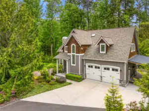 Charming curb appeal and timeless Northwest style welcome you home to this peaceful, well-crafted retreat.