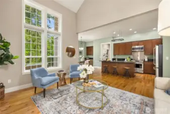 Vaulted ceilings enhance the sense of space and natural light in the living room.