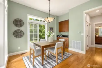 Sip your morning coffee while birdwatching from this peaceful garden-facing dining room.