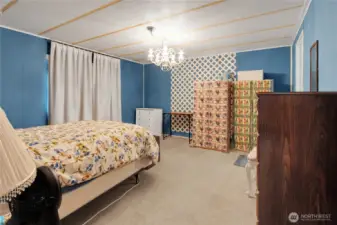 Primary bedroom with walk in closet and private bath