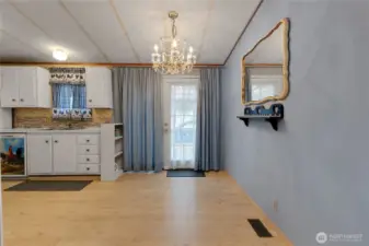 Dining area with French doors out to covered back deck