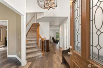 The house opens into a welcoming foyer with high ceilings, soft natural light and a spacious layout that sets the tone for the rest of the home