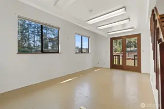 Bonus huge sunroom with tons of light and glass doors that open into the garden/yard area.