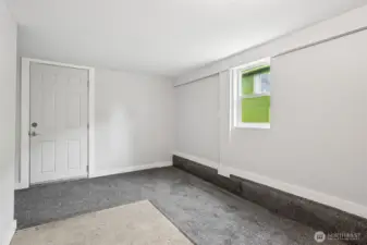 View from the laundry area. The door goes to the garage.