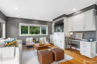This family room was an addition, and what a huge bonus this space is- it's the heart of the home! Notice that from this room, and from the kitchen, you have a view of the back yard-- ideal for keeping an eye on little people and pets.
