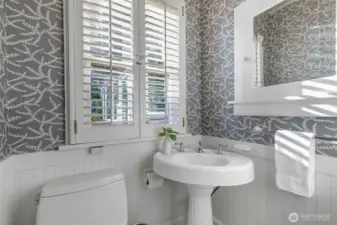 This super charming powder room is off the main floor hallway.