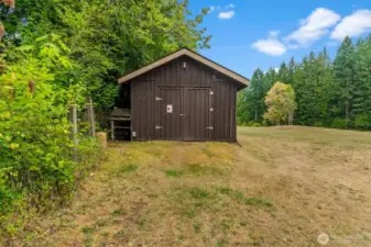 Shop constructed from trees originating on property