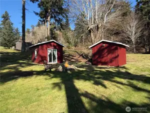 Outbuildings include Studio and roomy shed