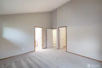 Primary bedroom en-suite bath on the left of the photo walk-in closet on the right.