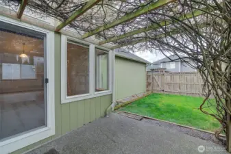 Slider from the family room and a second slider access the patio from the primary bedroom.