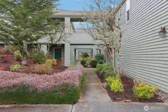 Walkway to front door - landscaping included in dues.
