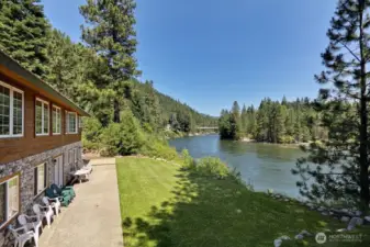 Welcome to Alpine Pension, Set along the Wenatchee River, this rare low-bank frontage offers direct access, peaceful surroundings, and a truly immersive waterfront experience