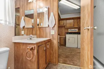 Full bathroom off the 2nd bedroom and laundry room