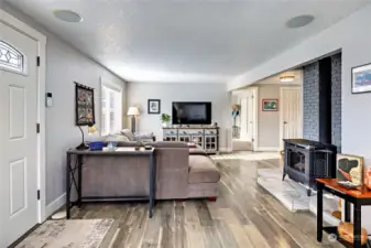 Living room with new natural gas free standing fireplace.