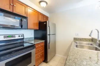 Great space in this kitchen plus you have a view from the kitchen sink!
