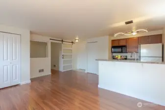 The Open Concept bedroom and living areas are perfect.  updated lighting fixtures, flooring and more