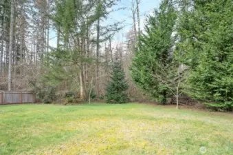 The greenbelt adds privacy and seclusion to this lot.