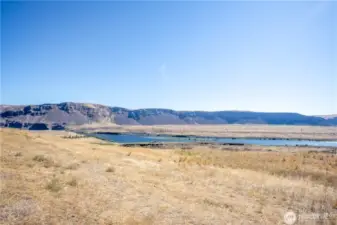 10.16 acres boasting views of the Columbia and basalt cliffs
