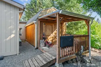 Beautiful well built shed with a ramp and covered entry! Excellent mancave,  She Shed or extra storage, the possibilities are endless.