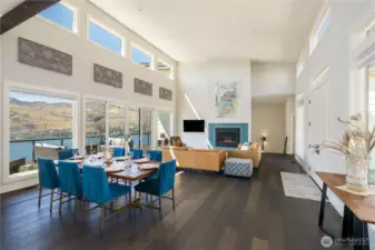 Gorgeous hardwood floors. Custom gas fireplace and sound baffles make this big space feel cozy and user friendly.
