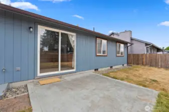 This patio off the rear of the home is ready for your barbecue and some outdoor furniture!