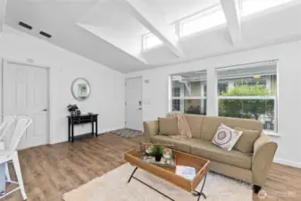 Spacious living room with vaulted ceiling