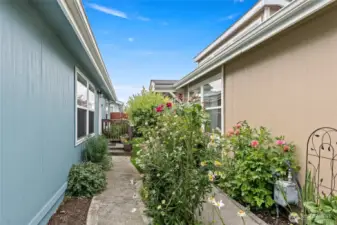 Walk up to the front door with beautiful flowers