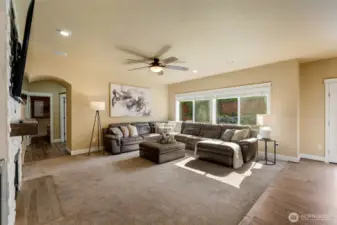 Large family room off kitchen overlooking backyard