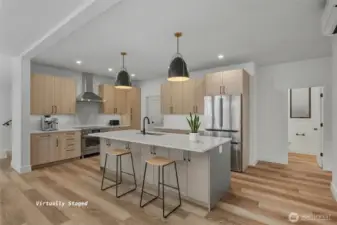 A view of the kitchen with high end appliances