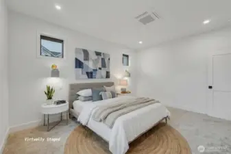 Another view of the primary bedroom