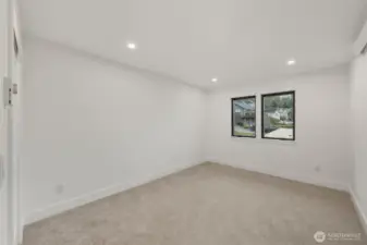 One of two large upstairs bedrooms.