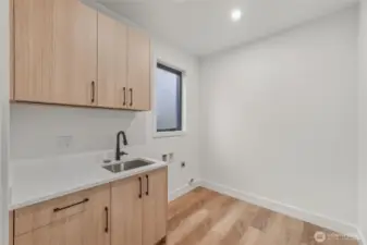 Large main floor laundry room.