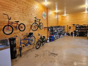 Knotty pine adorned workshop. Well lighted, insulated and heated.