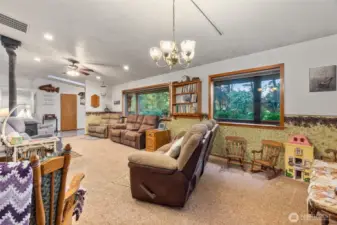 Picture windows view out to the parklike setting