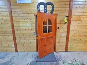 Note the handbuilt custom door mechanism at the office entry