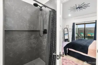 Roomy Shower extends to back wall