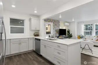 Spacious kitchen island with quartz countertops
