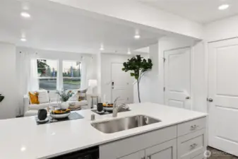 Light-filled kitchen island offering extra seating, prep space, and a natural gathering spot.