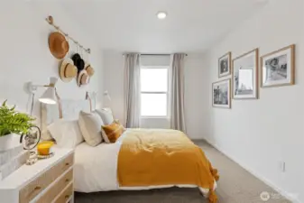 Versatile secondary bedrooms with bright, natural light—ideal for guests, a home office, or hobbies.