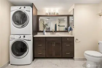 Bathroom with full sized washer/dryer