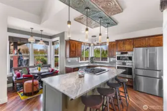 Show stopper kitchen is elegant and functional, cabinetry and placement all matter in a chefs kitchen and no detail was left out here! All new Bosche appliances installed in 2023, custom height bar stools for the custom island views of the incredible back yard.
