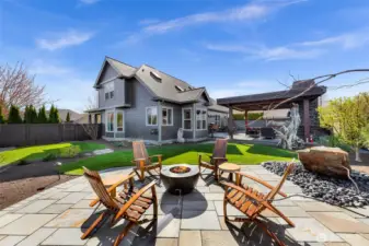 When one incredible outdoor space isn't enough, lets have two! Propane fire place, professionally plumbed to a 100 gallon tank, professional hard scaping and incredible fountain water feature rounds out this oasis.