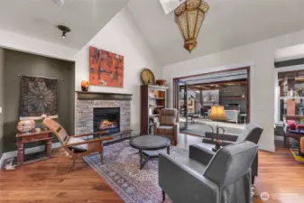 View of living space from the kitchen, leading directly to your outdoor fully covered living space